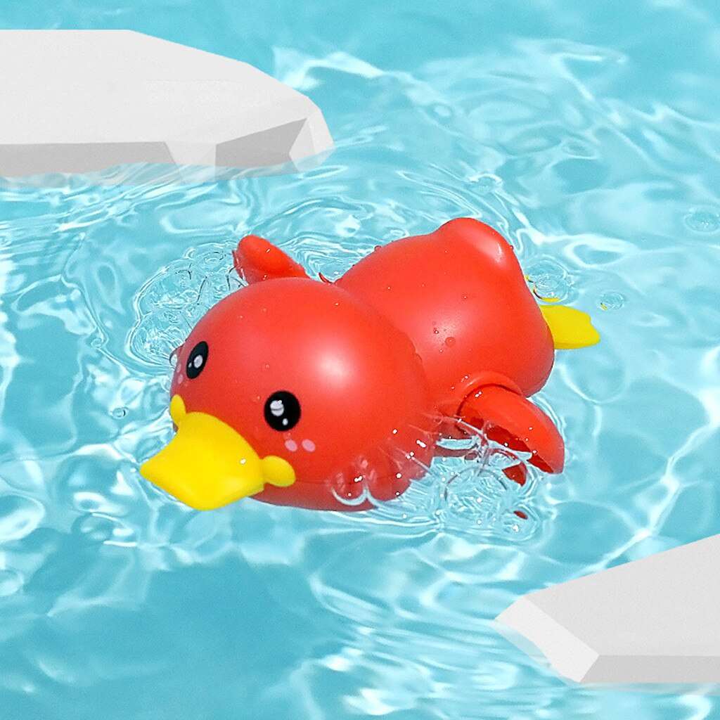 Cute red duck bath toy with clockwork mechanism for swimming and walking, perfect for bath time fun.