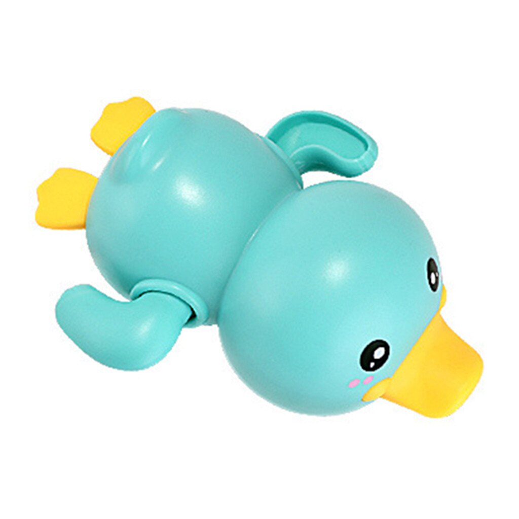 Cute blue duck bath toy with clockwork mechanism for swimming and walking, perfect for bath time fun.