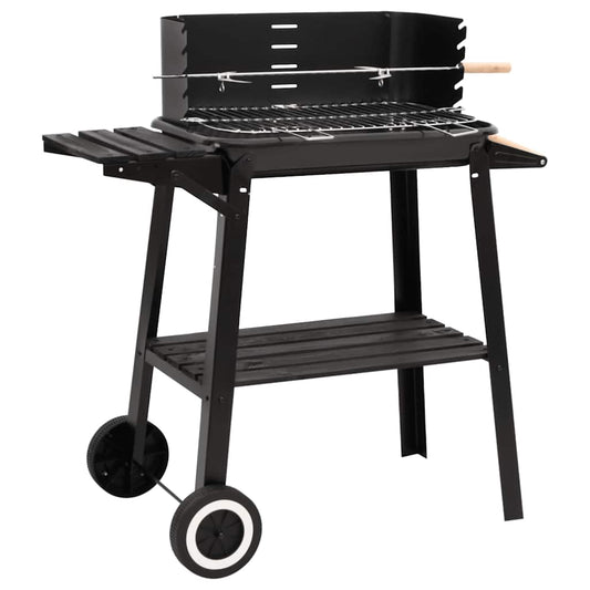 Black steel charcoal grill with wheels, wooden shelves and rotisserie spit