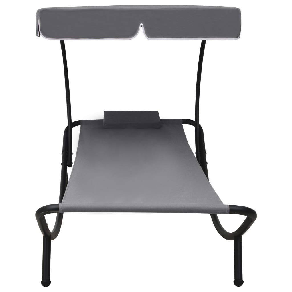 Outdoor daybed lounger 200×90×112 cm with canopy and water-repellent pillow in garden setting.