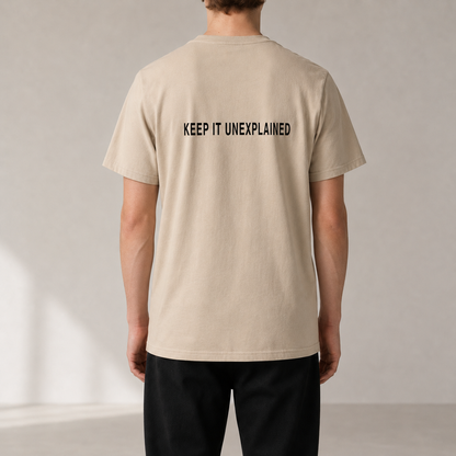 KEEP IT UNEXPLAINED Desert Dust organic statement T-shirt — realistic rear view on model